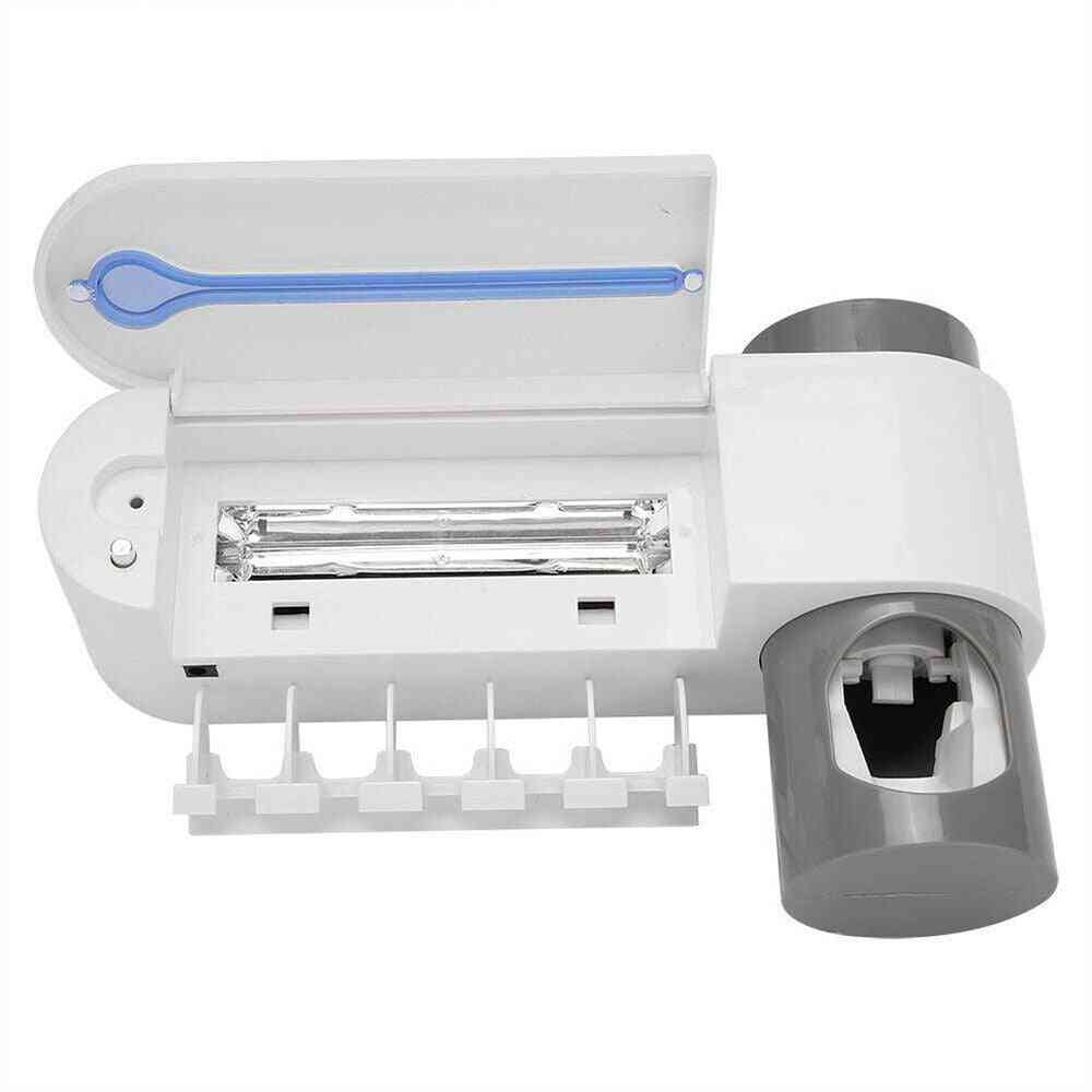 Ultrafialový sterilizátor zubnej kefky, držiak a automatický dávkovač žmýkačiek