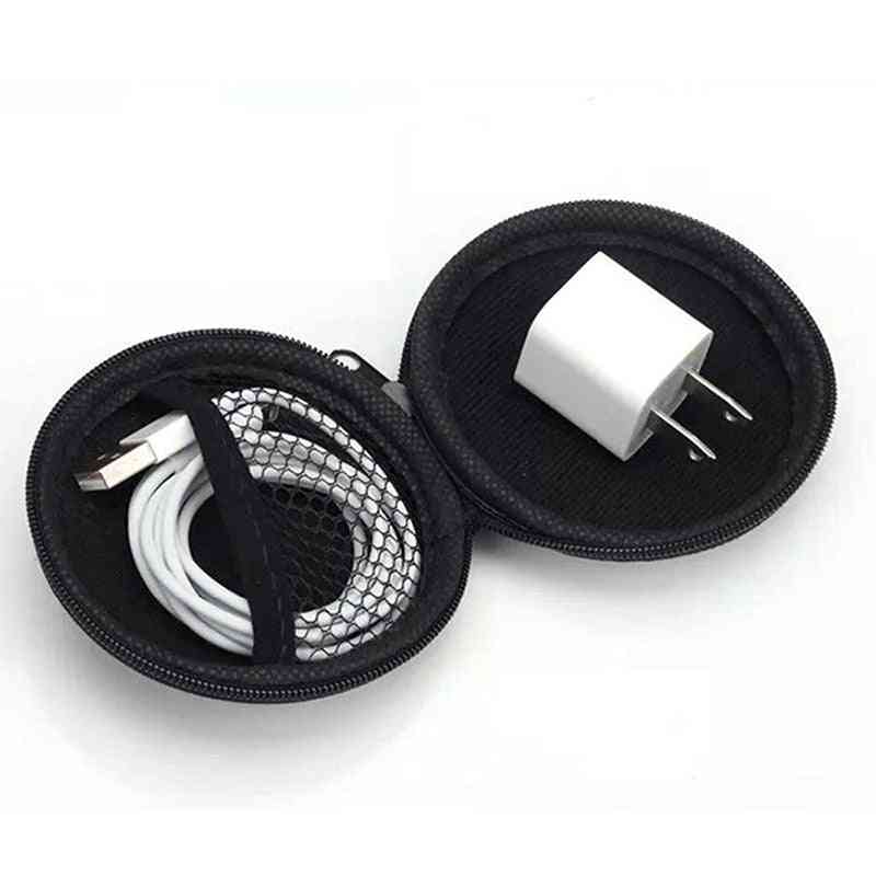 Shramba za slušalke / pomnilniško kartico in USB kabel