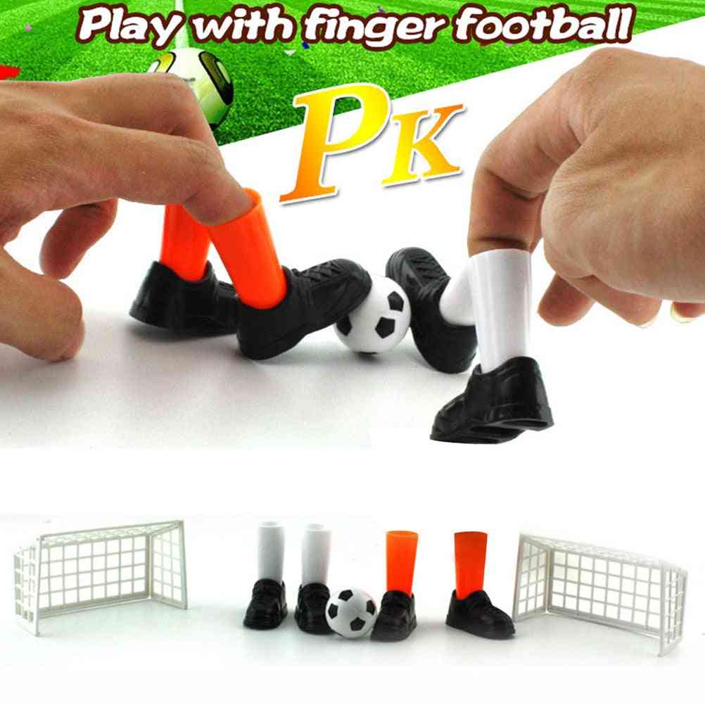Hauska jalkapallo, sormen juhlapelien lelusetti - kahdella kohteella, hauskoja gadget-leluja lapsille (näyttelynä)