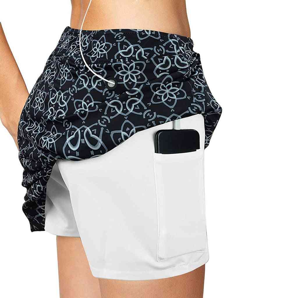 åndbare trykte nederdele med shorts og indvendige lommer