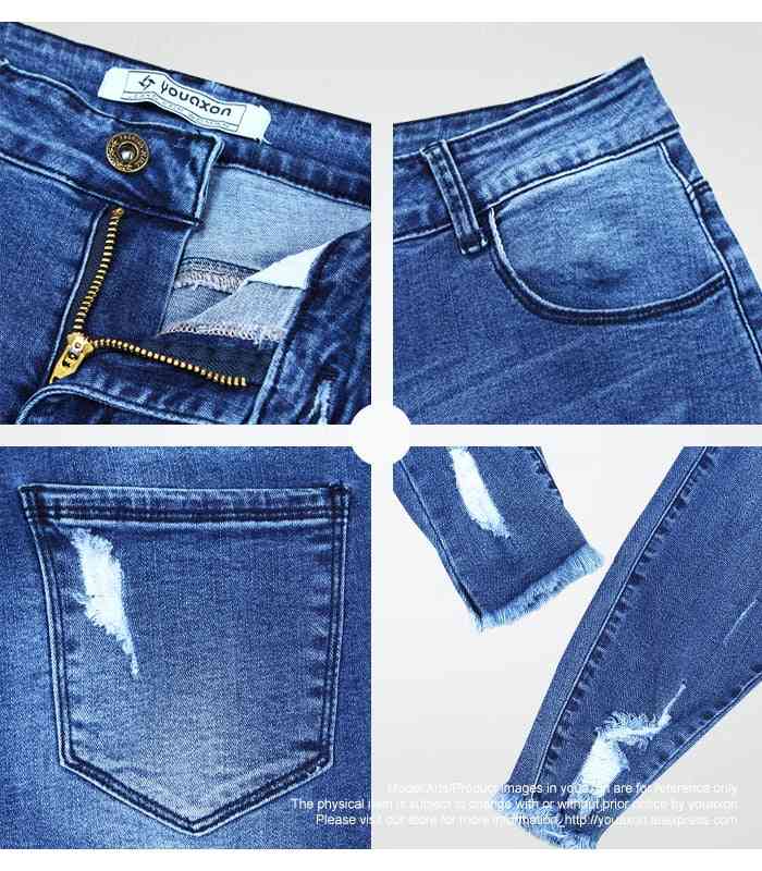Ultra rekbare blauwe gescheurde jeans met kwastjes