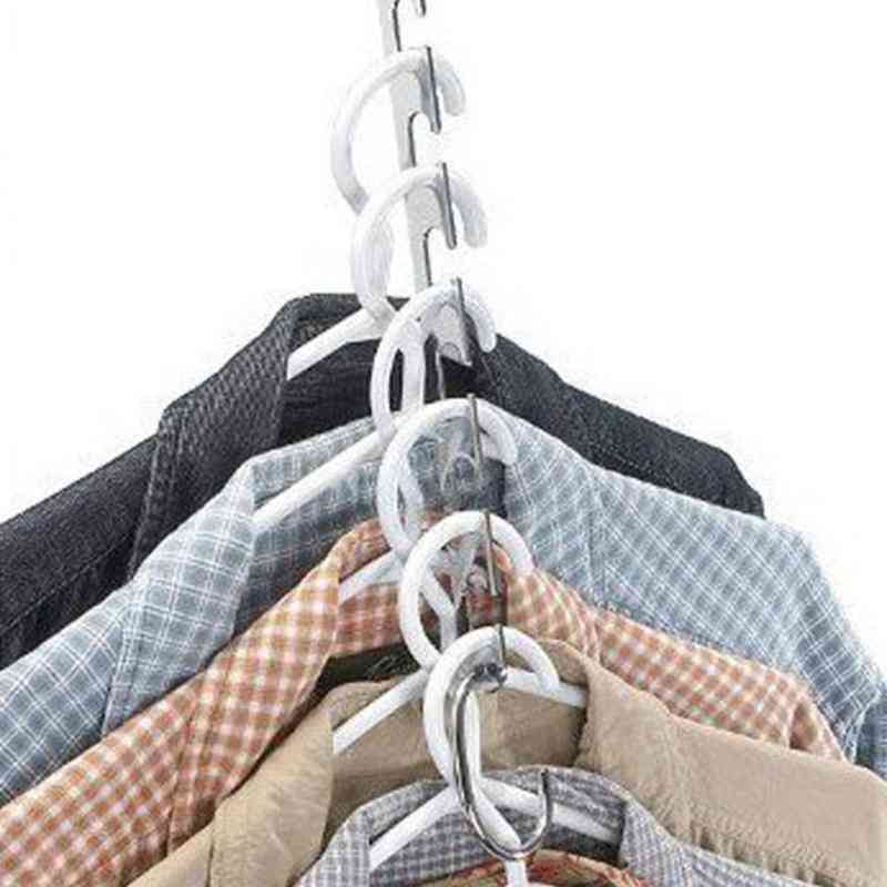 Metallkläder skjortor snygga galgar, utrymme i garderoben att spara praktiska ställningar