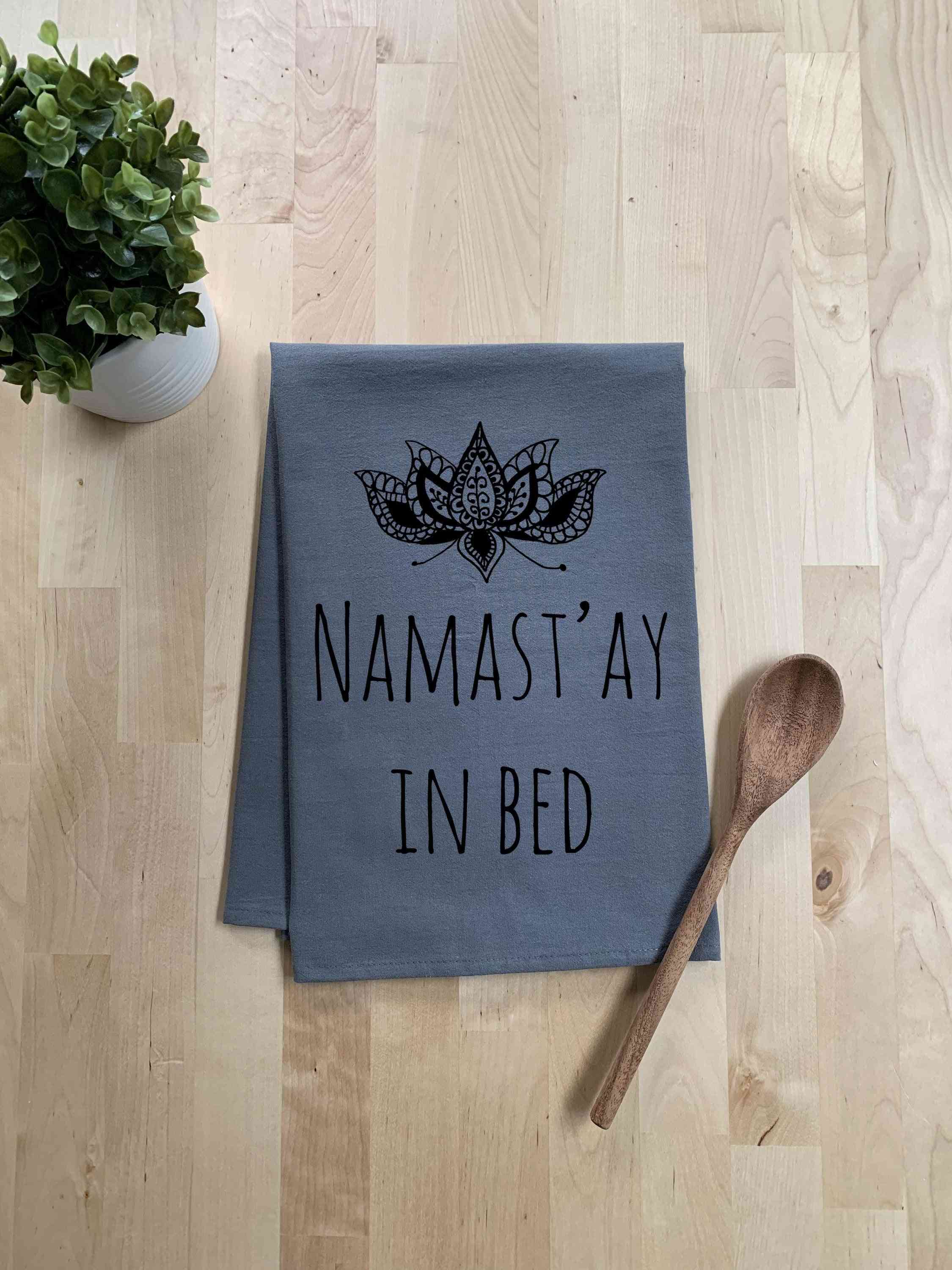 Namast'ay no pano de prato da cama
