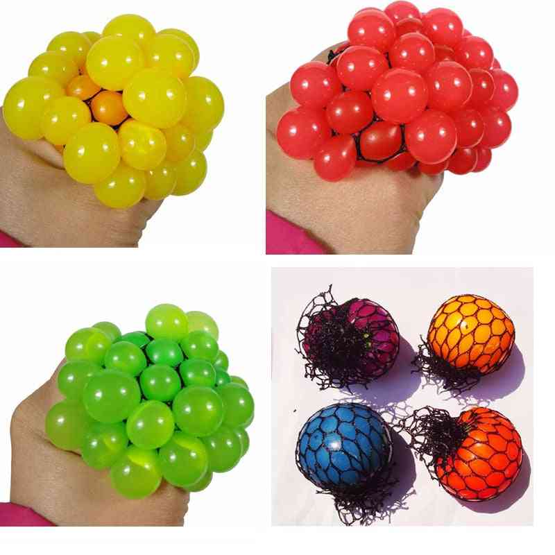 Handknåda- sensorisk nätboll, druvfruktig press, lek
