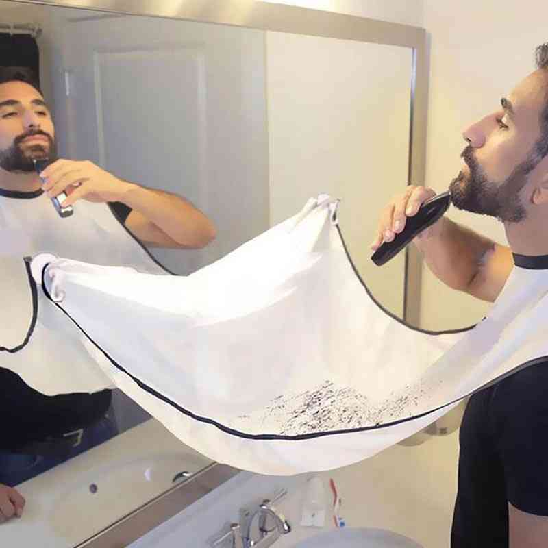 Mand badeværelse mandlige forklæde barbermaskine holder hår barbere skæg